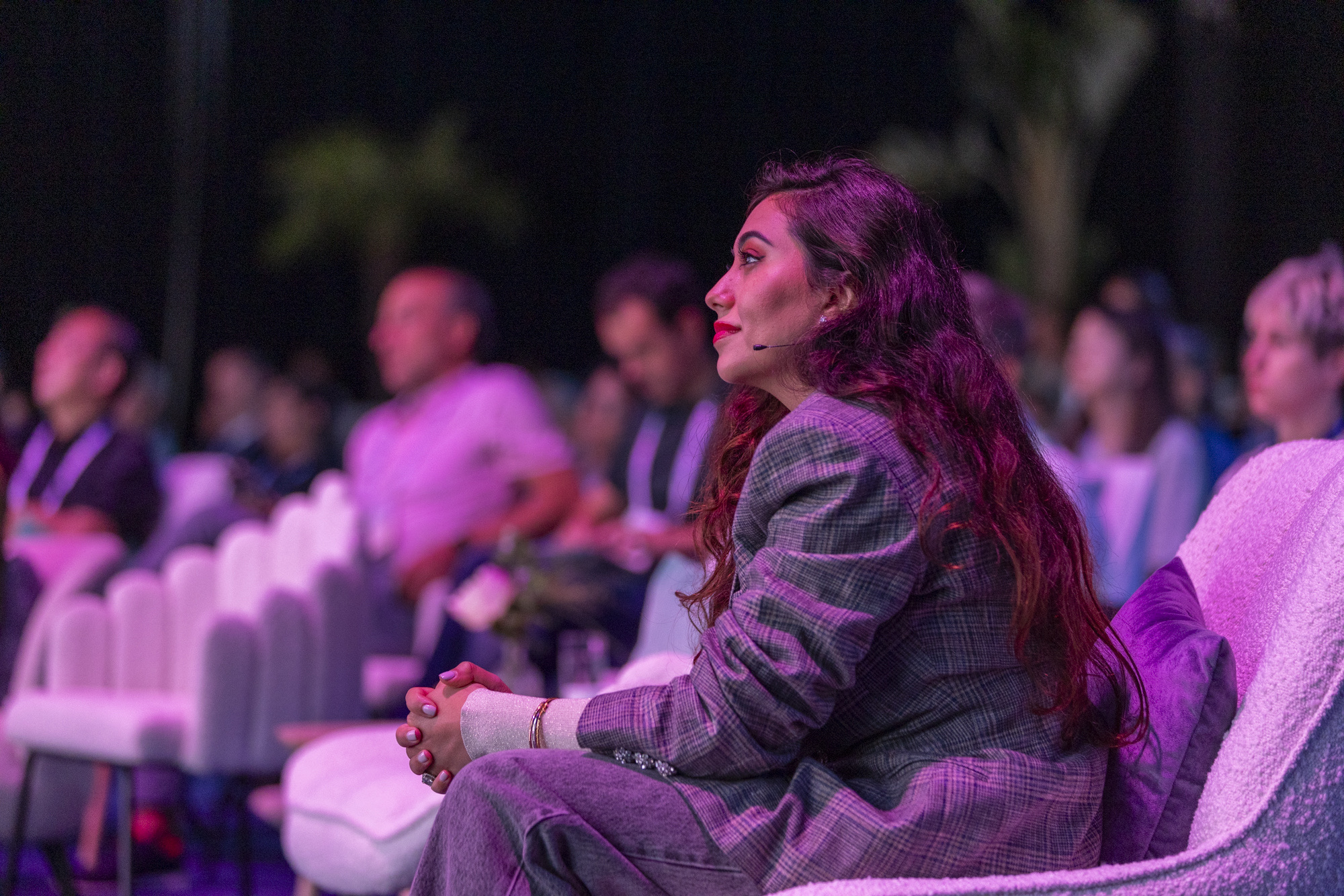 Shama Hyder listening at a panel event